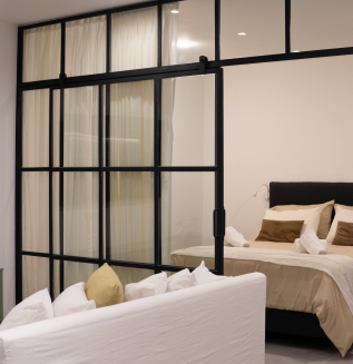 Dormitorio de una propiedad gestionada por By Vizion
